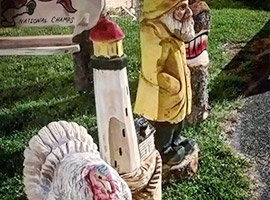 Turkey and Lighthouse Chainsaw Sculptures